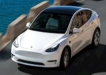 特斯拉公布2025年财报：营收史上首次下滑 全年净利润腰斩